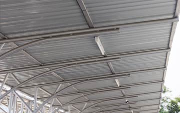 installing Dropping Well metal roofing