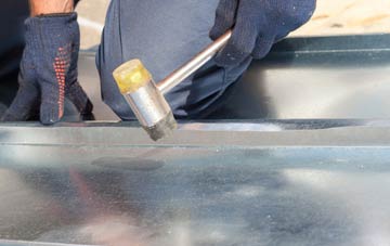 Dropping Well metal roofing costs